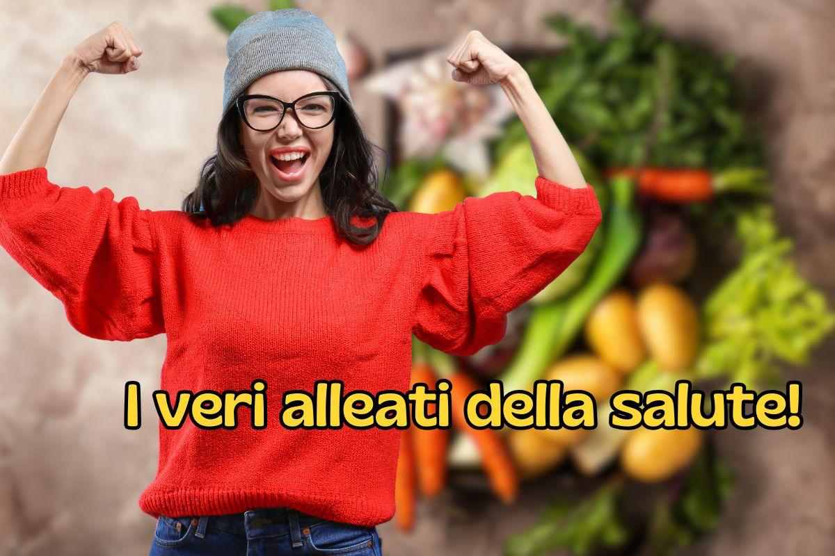 una ragazza che esulta e dietro del cibo