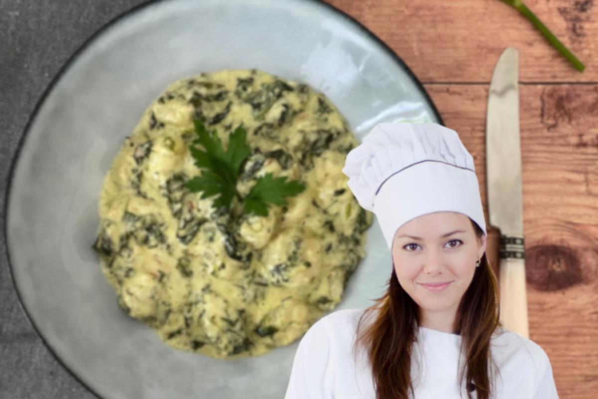 donna vestita da chef con piatto cremoso