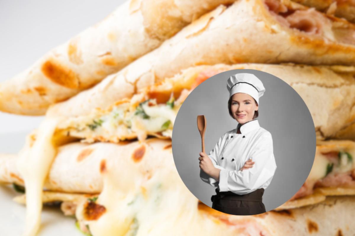 donna vestita da chef con piadine farcite